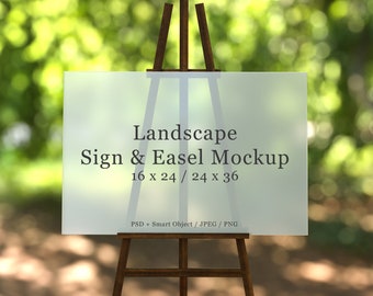 以下が含まれることがあります： 「Landscape Sign & Easel Mockup 16 x 24 / 24 x 36 PSD + Smart Object / JPEG / PNG」と書かれた白い看板がついた木製イーゼル。イーゼルはぼやけた緑色の背景の前にある。