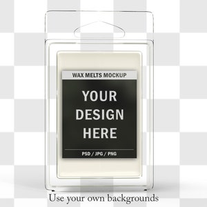 May include: A clear plastic package containing a rectangular wax melt mockup. The label on the wax melt reads "WAX MELTS MOCKUP" above the text "YOUR DESIGN HERE". Below the text is "PSD / JPG / PNG". The package is designed to be hung.