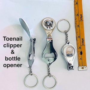 Obcinacz do paznokci i otwieracz do butelek Dungeon Crawler Daddy Tax