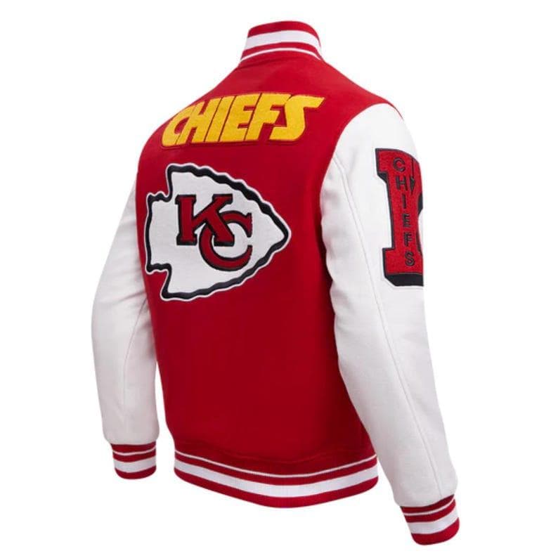 May include: Red and white varsity jacket with the word "CHIEFS" in yellow lettering on the back. The jacket features white sleeves and a "KC" logo patch. The number "1" is on the right sleeve.