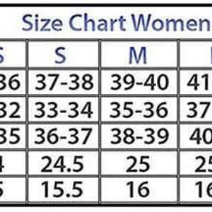 May include: A size chart for women, with measurements in inches. The chart includes bust, waist, hips, sleeves, and shoulder measurements for sizes XXS to XXXL. The text "Size Chart Women" is at the top.