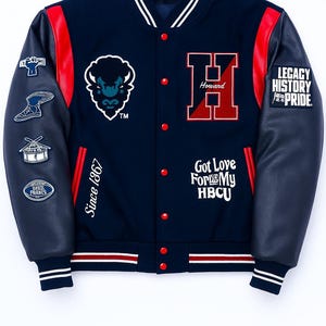 May include: Navy blue and red varsity jacket with leather sleeves. Features the Howard University "H" logo, a bison emblem, and text that reads "Legacy History Pride" and "Got Love For My HBCU". The jacket has white stripes and red accents.