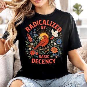 May include: A set of three ceramic mugs with a speckled, matte finish. The mugs are in shades of cream, light gray, and dark gray. Each mug has a simple, minimalist design and a rounded handle.