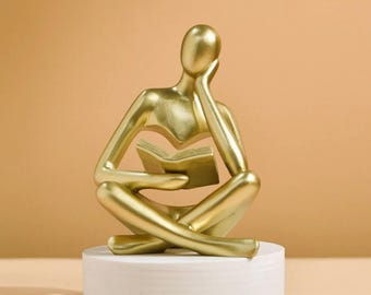 Abstrakte Denker Lesestatue, Gold-Finish, minimalistische Regaldekoration, Schreibtischverzierung, Buchliebhaber-Figur
