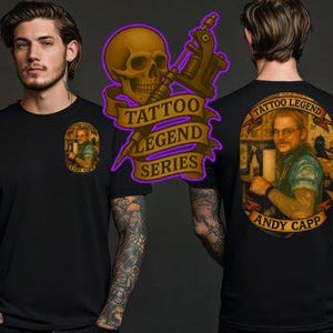 May include: Black t-shirt featuring a front chest and back graphic. The front graphic is an oval portrait. The back graphic is a portrait of a man with the text "TATTOO LEGEND" and "ANDY CAPP". A skull and tattoo gun graphic is also present.