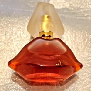 Dali Parfum de Toilette, Salvador Dali for women, 50ml/1.66 oz, Spray, Full, Fun bottle designed in the shape of Lips & Nose Launched 1985