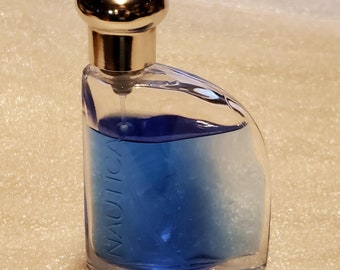 NAUTICA by Nautica eau de toilette for MEN, 1.7 fl oz, over 90% full,  a Woody Chypre fragrance for men, launched in 1992.