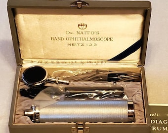 Dr. Naito&#39;s Hand-Ophthalmoscope Neitz 1 2 3, made in Japan, very nice condition, complete with paperwork & case. Vintage medical instrument.