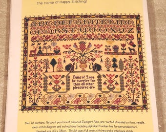 BOTHY THREADS KIT complete, Pains Of Love, Designed by Moira Blackburn Contains 16 ct. colored Zweigart Aida, strand cotton, instructions