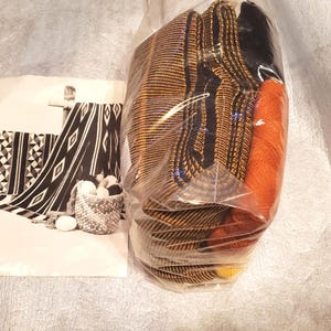 NAVAJO & MOHAWK AFGHAN Kit included: Knitted panels, yarn for crocheting borders and tassels, instructions. By Studio Knitting Co.