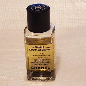 POUR MONSIEUR Invigorating Concentrate Aftershave Lotion by CHANEL,  1.7 oz, about 90% Full. The Scent was Launched in 1955.