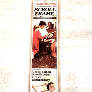 May include: A white ceramic mug with a black handle and the text "But First, Coffee" in a bold, black font. The mug is sitting on a wooden surface. The mug is approximately 4 inches tall.