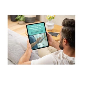 May include: A person holding a tablet displaying the title "How to Identify and Eliminate Wrong Answers on Nursing Exams." The tablet screen shows a nurse using a tablet. The background includes a couch, a table, and plants.