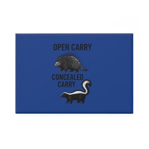 May include: A rectangular blue magnet with the words "OPEN CARRY" and "CONCEALED CARRY" in black text. The top of the magnet features a porcupine illustration, and the bottom features a skunk illustration.