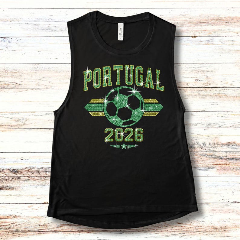 May include: Black sleeveless tank top displaying the brilliant rhinestone 'Portugal 2026' design. An ideal look for hot summer match days, featuring high-shine green and gold patriotic stones.