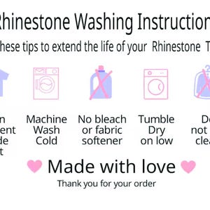 May include: A white instructional card titled Rhinestone Washing Instructions with black text and pink icons. It features five steps: turn garment inside out, machine wash cold, no bleach or fabric softener, tumble dry on low, and do not dry clean.