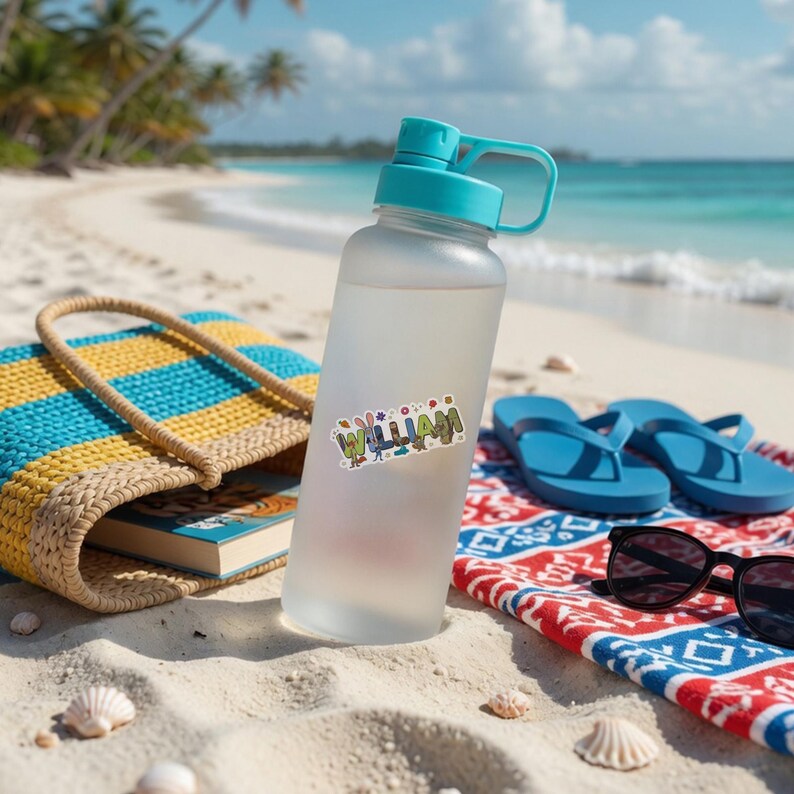 May include: A frosted clear plastic water bottle with a teal screw-top lid and handle. A sticker on the bottle features the name WILLIAM in colorful, stylized block letters decorated with small floral and nature-themed graphic elements.