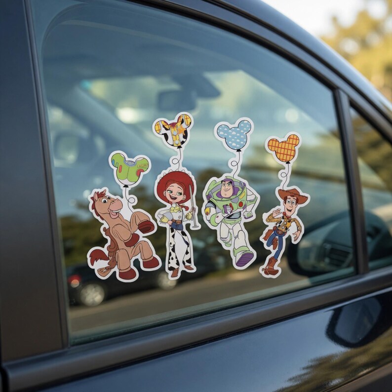 May include: A collection of colorful vinyl stickers featuring characters from the animated film Toy Story. The stickers include Woody, Buzz Lightyear, Jessie, and Bullseye, each holding a Mickey Mouse-shaped balloon. The stickers are displayed on a car window.