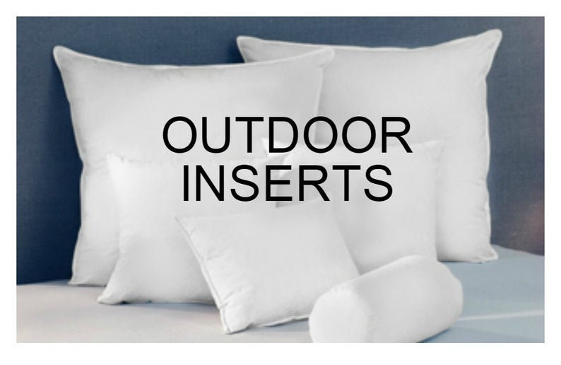 May include: A close-up of five white pillows on a blue bed. The pillows are arranged in a row, with the largest pillow in the back and the smallest pillow in the front. The text "OUTDOOR INSERTS" is printed in black on the largest pillow.