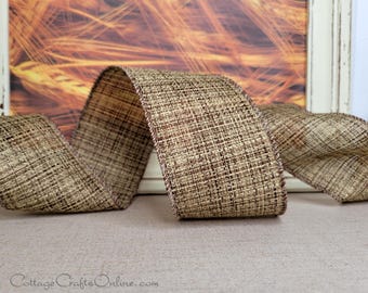 May include: A wide, brown, textured ribbon with a woven, cross-hatched pattern and finished edges. The ribbon is folded into loose, flowing curves, displaying its consistent, earthy, dark brown and tan colour palette throughout the material.