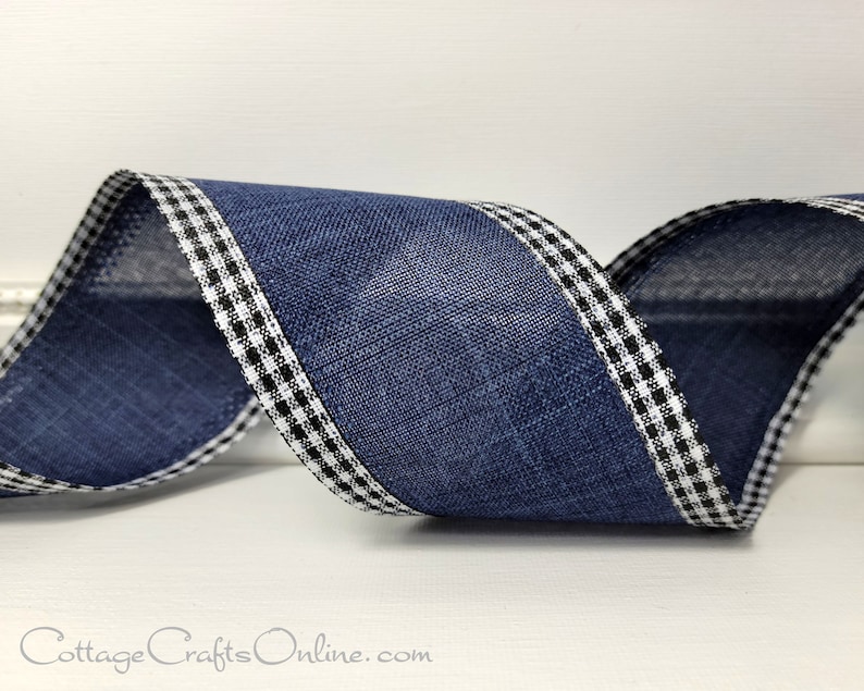 May include: Blue ribbon with a black and white gingham trim. The ribbon is made of a textured fabric and has a subtle sheen.