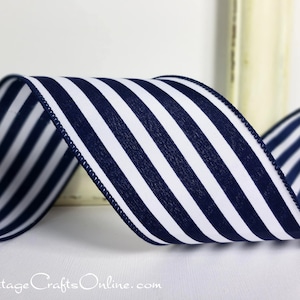May include: Navy blue and white striped ribbon with a satin finish. The ribbon is 2.5 inches wide and is perfect for adding a nautical touch to your crafts.