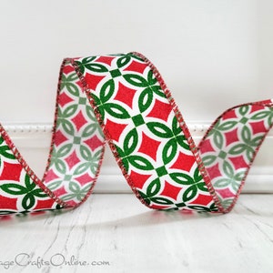 May include: Red and green patterned ribbon with a white background. The ribbon has a diamond and circle design with a glittery finish.