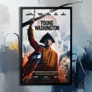 以下が含まれることがあります： 「Young Washington」の映画ポスター。赤いコートと三角帽子をかぶり、剣を持つ男性が描かれています。ポスターには俳優の名前と「Independence Day Weekend In Theaters July 3」の文字が含まれています。