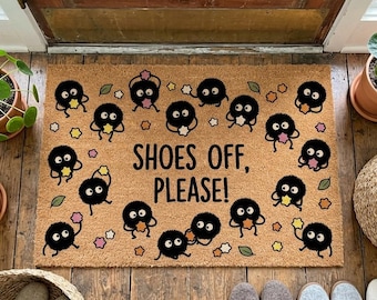 Zerbino di benvenuto con la scritta "Scarpe tolte, per favore" e la scritta "Scarpe tolte, per favore" sono un'idea per la decorazione del portico ispirata al film.