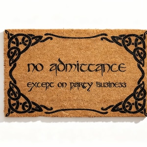 May include: A rectangular doormat made of natural brown coir fibre. The mat features a black Celtic knotwork border and the words "no admittance except on party business" in a stylized font.