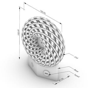 May include: A 3D-rendered white object featuring a spiral coil design, labelled "Coil", on a rectangular base. Dimensions are indicated: 14.5 cm high and 12 cm wide. The base is labelled "Base" and "TypeC".
