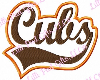 May include: A brown and orange embroidered design of the word "Cubs" in a cursive font. The design is in the shape of a heart.
