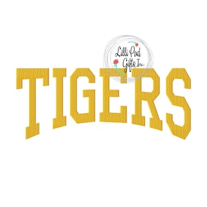 May include: A gold embroidered design of the word "TIGERS" in a varsity style font.