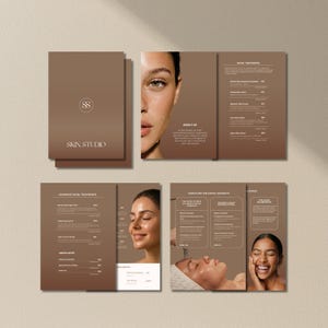 May include: A brochure set for a skin studio, featuring a brown and white color scheme. The brochure includes images of women's faces and text about facial treatments and wellness journeys. The studio's logo is visible.
