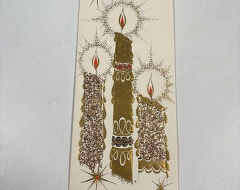Tarjeta navideña con vela de lámina dorada con purpurina en relieve, estilo Atomic Starburst de mediados de siglo
