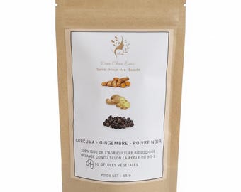 May include: A brown paper pouch containing 90 vegetable capsules of turmeric, ginger, and black pepper. The label features images of these ingredients, the text Dien Chan Emei, and states 100% organic agriculture with a net weight of 65 grams.