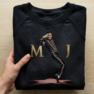 Collage displaying a 70 plus King of Pop PNG bundle featuring Michael Jackson inspired digital download designs. The graphic includes various 80s music legend sublimation files, such as retro singer portraits, iconic dance silhouettes, glittering gloves, fedora hats, and vintage music art typography. Text in the center reads 70+ Michael Jackson, 300-DPI, Print Ready, PNG Files. High-resolution MJ clipart perfect for DTG t-shirt design and crafts.