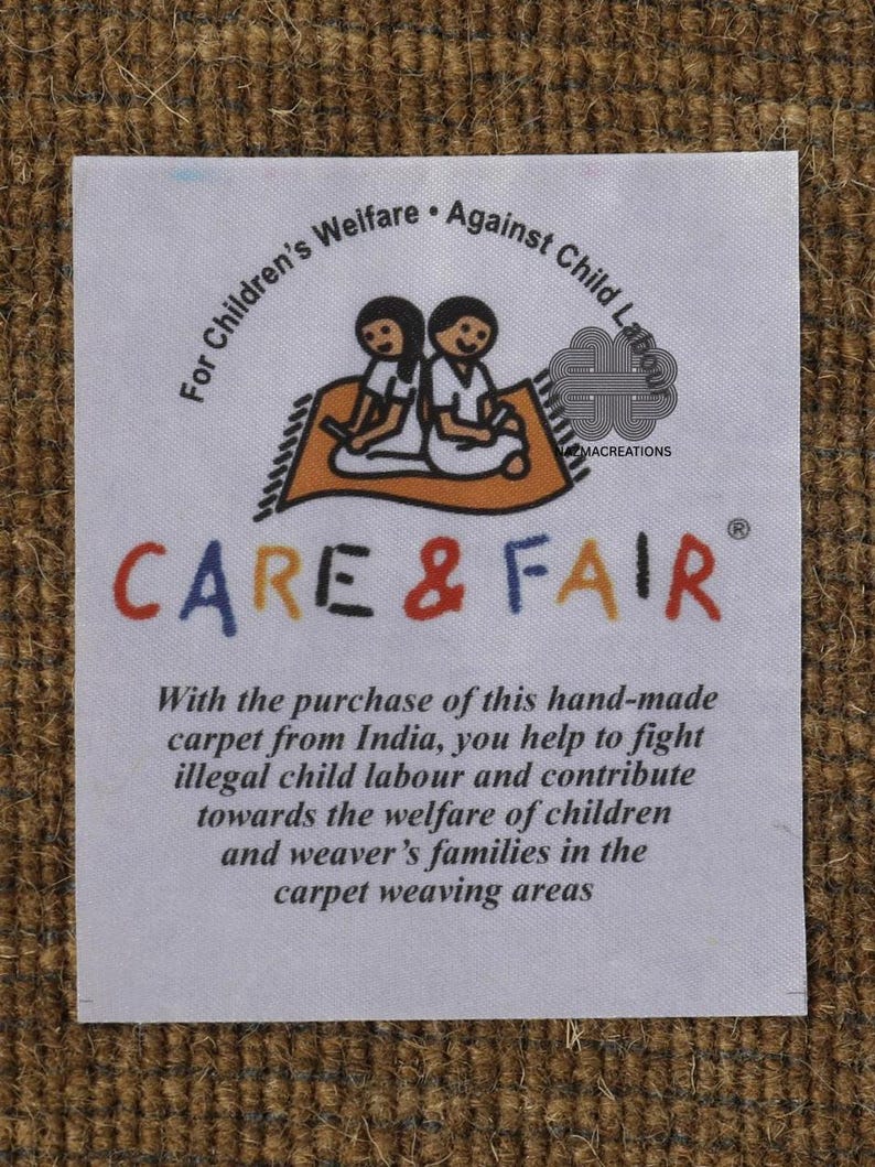 May include: A white label with text and a graphic of two children on a carpet. The label reads "CARE & FAIR" and promotes the purchase of handmade carpets from India to fight child labor and support children's welfare.
