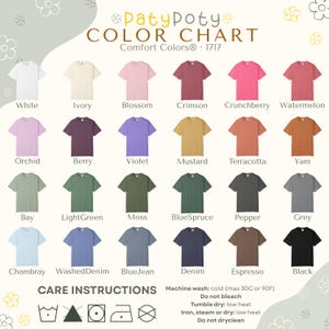 May include: A color chart for Comfort Colors 1717 t-shirts featuring twenty-four color swatches labeled White, Ivory, Blossom, Crimson, Crunchberry, Watermelon, Orchid, Berry, Violet, Mustard, Terracotta, Yam, Bay, LightGreen, Moss, BlueSpruce, Pepper, Grey, Chambray, WashedDenim, BlueJean, Denim, Espresso, and Black, with care instructions at the bottom.