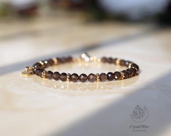 Sierlijke rookkwartskristalarmband voor vrouwen, natuurlijke rookkwarts Energiestabiliteitsbescherming Aarding kralenarmband edelsteensieraden
