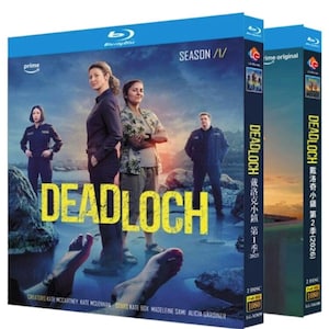 May include: Two Blu-ray disc cases for the TV series "Deadloch." The cases are blue with images of the cast and the show's title in large yellow letters. The cases also have the Prime Video logo and the Blu-ray Disc logo.