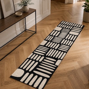 Hand tufted black & ivory geometric runner rug on herringbone oak floor, modern hallway runner carpet for entryway, luxury minimalist home decor