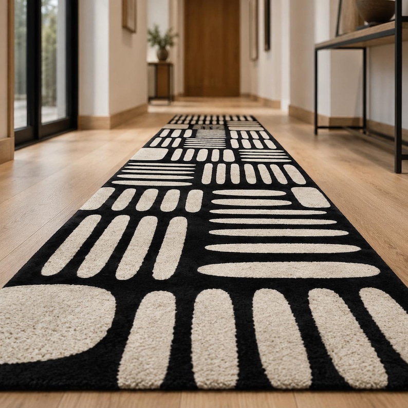 Modern black & ivory geometric runner rug in a minimalist hallway, hand tufted wool long carpet for entryway, corridor, and contemporary home interiors