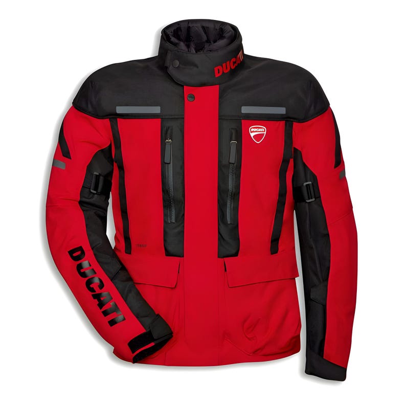 May include: A red and black motorcycle jacket with the Ducati logo. The jacket has a high collar, multiple zippered pockets, and black accents on the sleeves and shoulders. The word "Ducati" is printed on the sleeve.