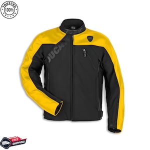 May include: Black and yellow motorcycle jacket with the word "Ducati" printed on the chest. The jacket has a black body with yellow shoulders and sleeves. It features a zipper closure and a small pocket on the chest.