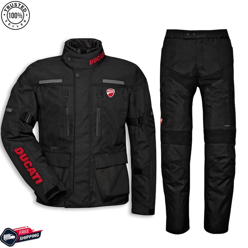 May include: Black Ducati motorcycle jacket and pants set. The jacket has red "Ducati" lettering and logo, multiple pockets, and reflective accents. The pants are black with reinforced knee panels.
