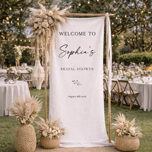 May include: A rustic wooden sign with the text "Welcome to our home" in a handwritten style. The sign has a distressed finish and a simple, inviting design, suitable for a front porch or entryway.