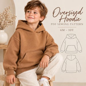 May include: A brown oversized hoodie with a hood, long sleeves, and a front kangaroo pocket. The text reads Oversized Hoodie PDF SEWING PATTERN 6M - 10Y. A black and white line drawing shows the front and back views of the hoodie design.