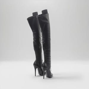 “Classic lace-up round toe knee boots with high 14cm stiletto heel for fashion styling, rear view.”