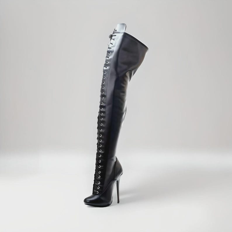 “Classic lace-up round toe knee boots with high 14cm stiletto heel for fashion styling.”